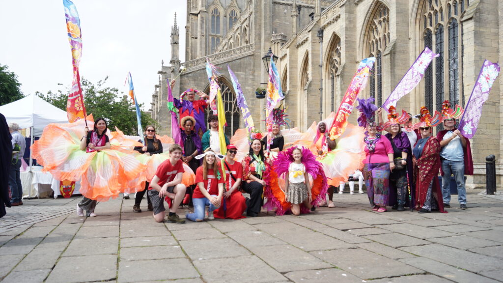 Group image of people enjoying taking part in an Transported Art event.