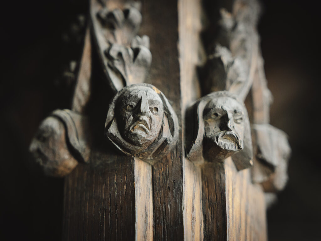 Carved wooden heads inside St Botolph’s Church in Boston, inspiration for the 1000 Faces community arts project
