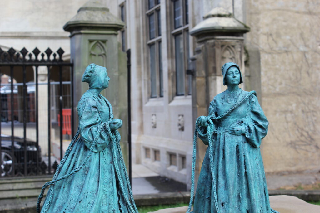Bronze Pilgrim Woman sculptures by Rachel Carter outside St Botolph’s Church in Boston Lincolnshire