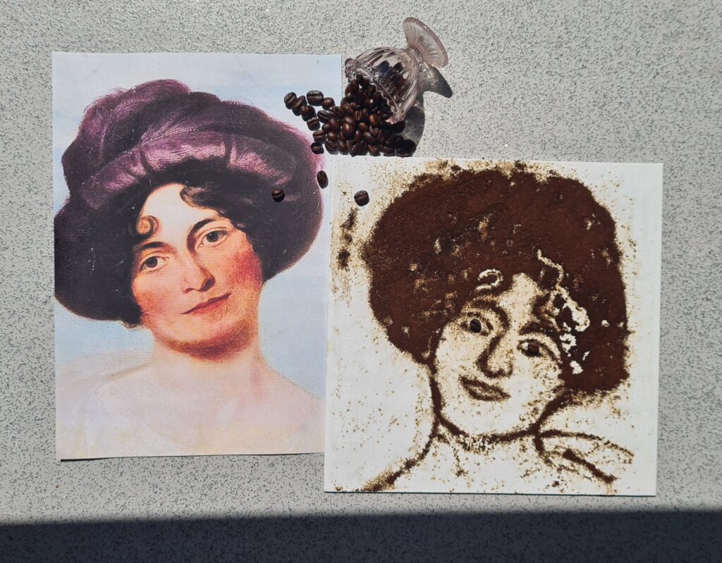 A printed historical portrait is displayed beside a creative interpretation made using coffee grounds and coffee beans. Spilled coffee beans from a small decorative cup help recreate the sitter’s hairstyle and facial features.