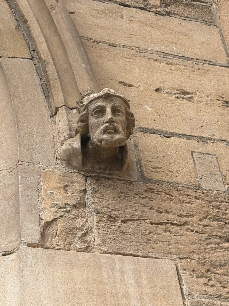 Stone carved heading adjoining the Boston Stump building