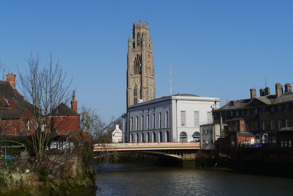 Wide shot view of St Botolph's tower, Assembly Rooms and bridge
