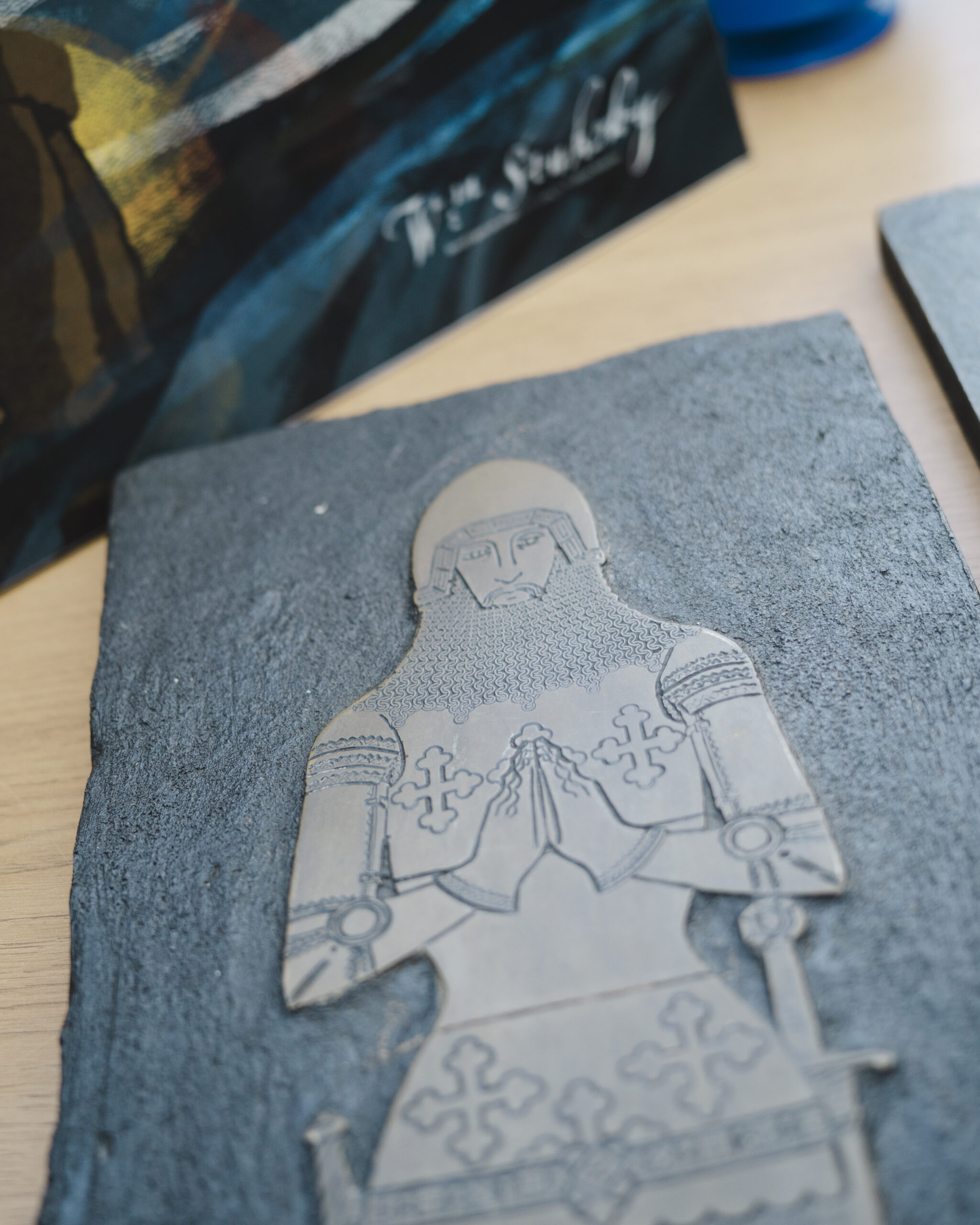 A close image of a medieval solider etched brass that can be used for brass rubbing activities