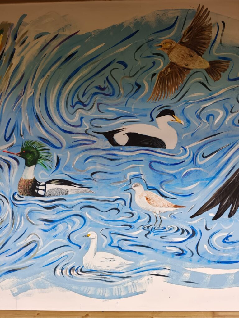 Detail of the Flyways Mural depicting coastal and wetland birds swimming and flying through swirling blue water.