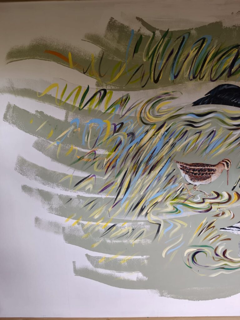 Detail of the Flyways Mural showing wetland birds among reeds and water at RSPB Freiston Shore.